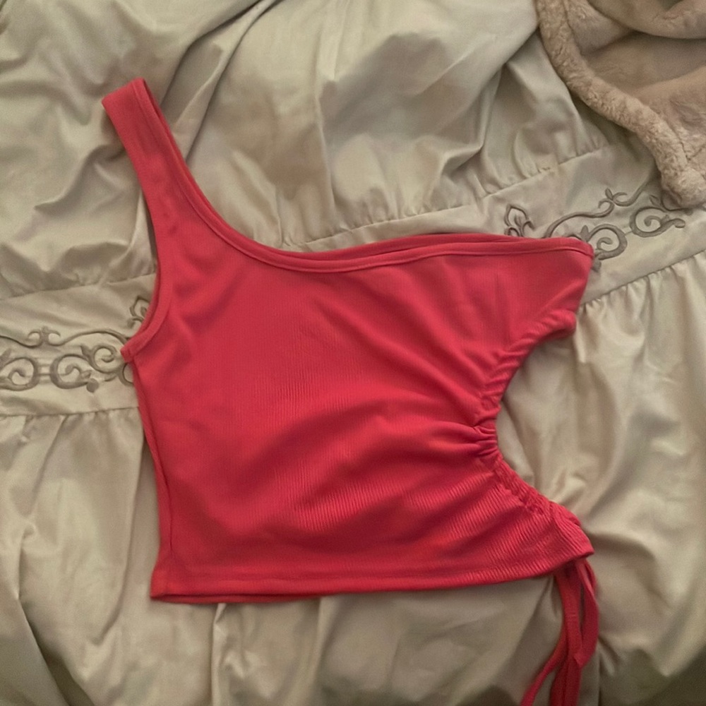 One strap hot pink tank top with cut out on the side.